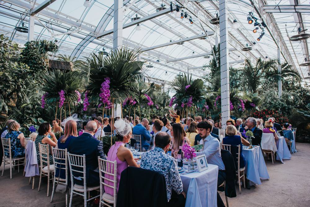 tropical themed botanical wedding reception, glass house